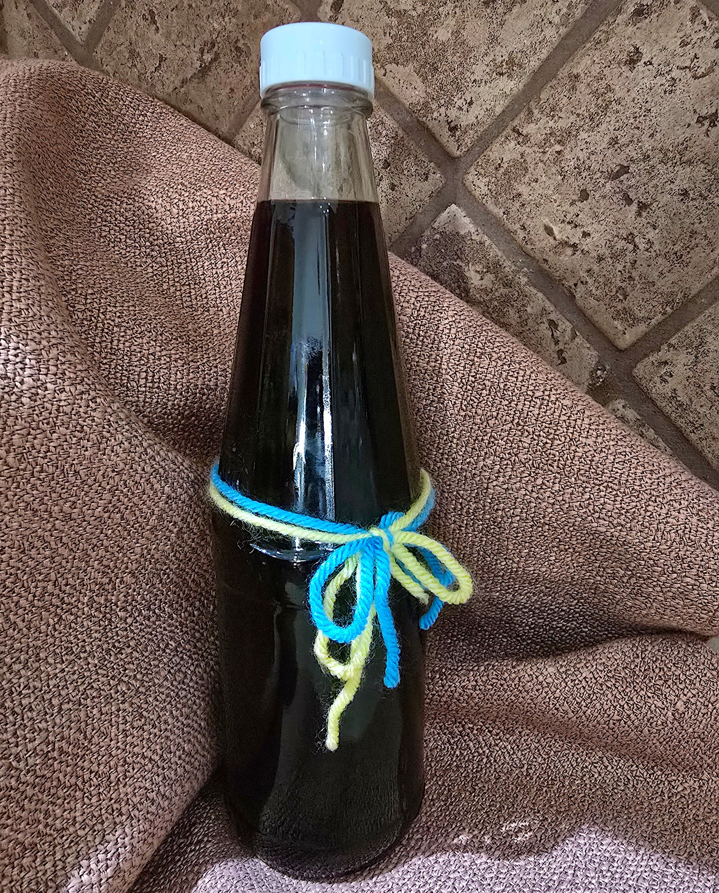 Finished product of healthy probiotic red wine vinegar made at home.