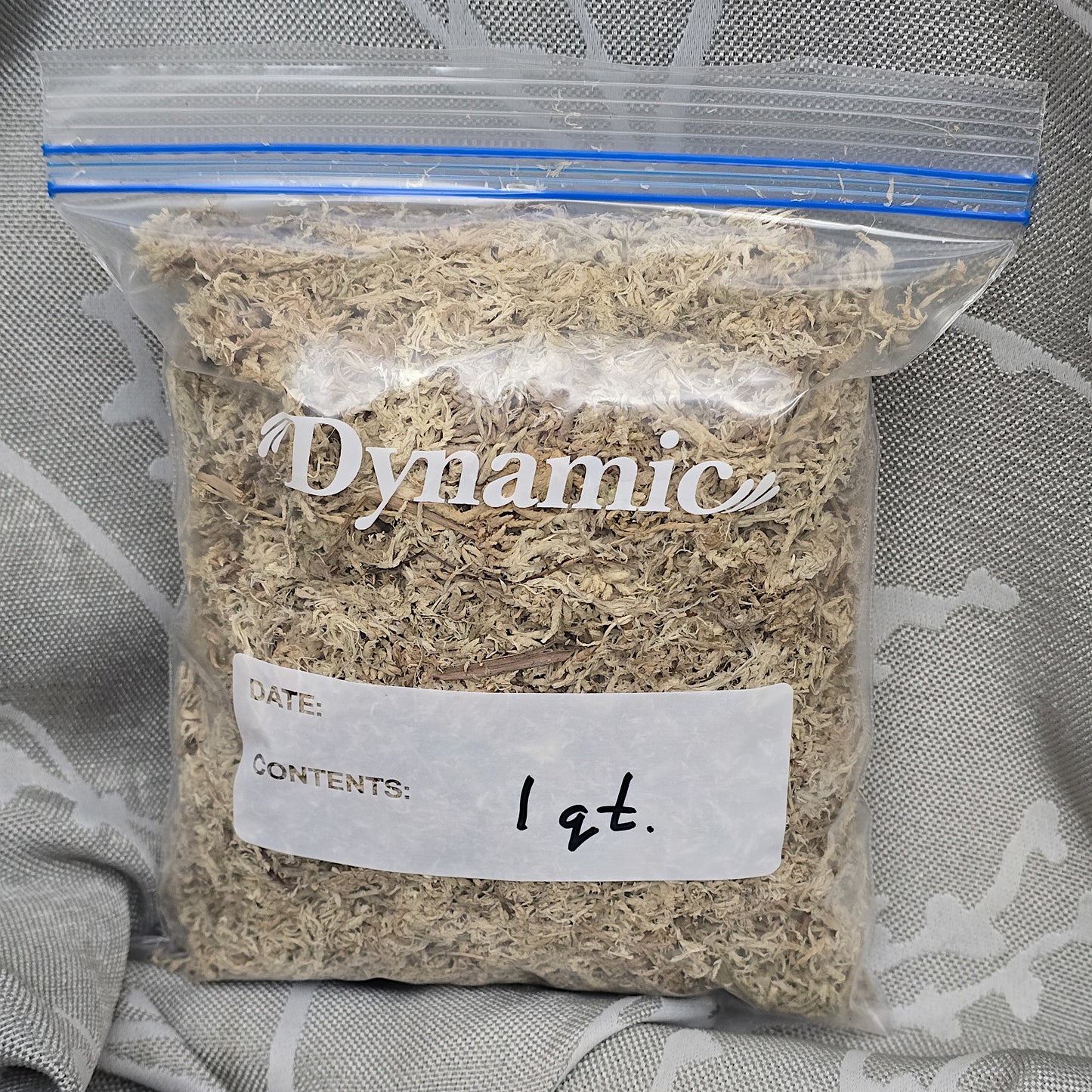 A 1-quart package of clean natural dry sphagnum moss for plants.