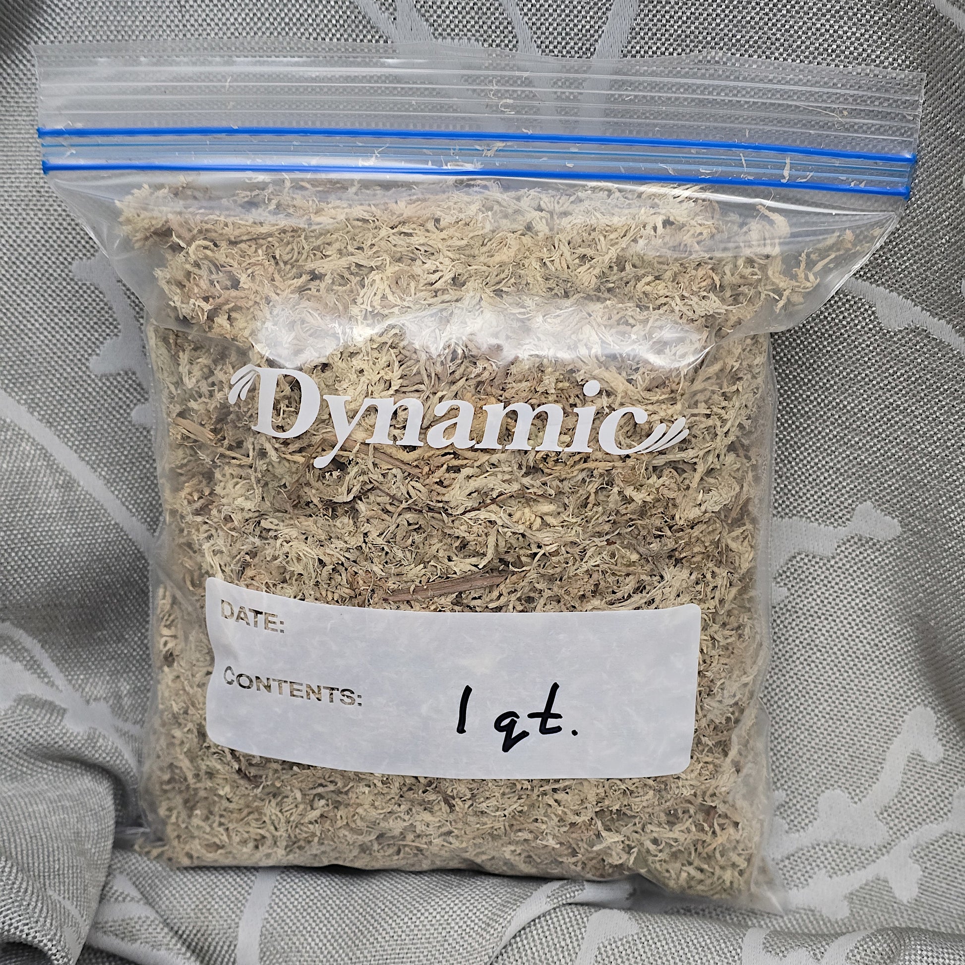 A 1-quart package of clean natural dry sphagnum moss for plants.